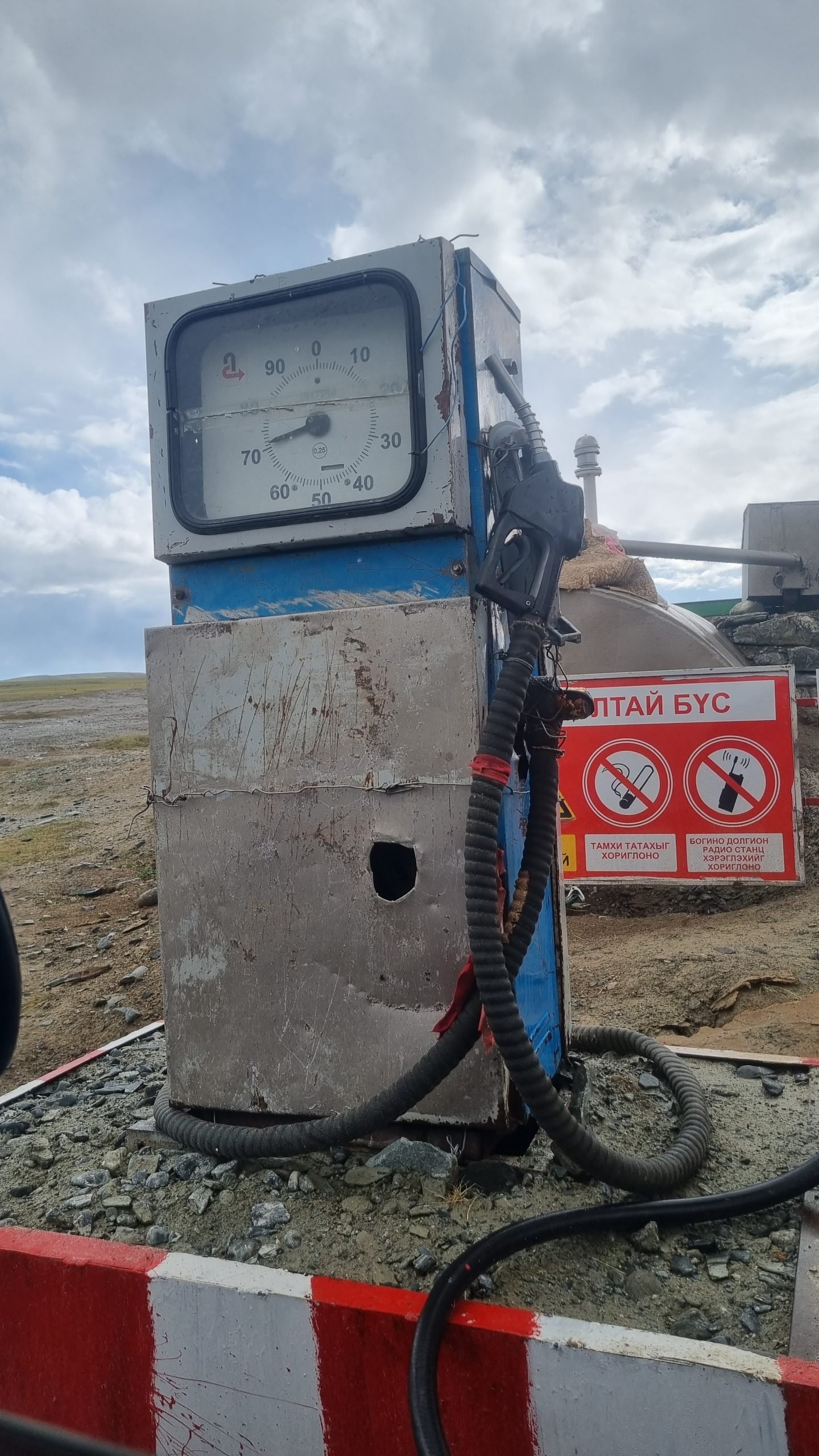 There are two gas pumps at the crossing.